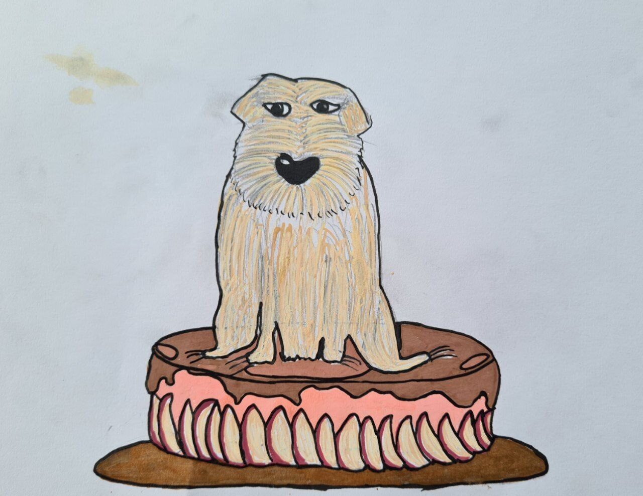 EIn Hund sitzt auf einem Kuchen
